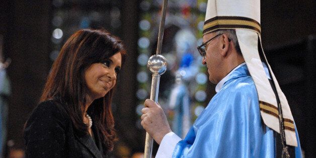 Undated file photo of Argentina's cardinal Jorge Mario Bergoglio shaking hands with Argentine President Cristina Fernandez de Kirchner in Lujan, some 70 km of Buenos Aires. Bergoglio has been elected Pope on March 13, 2013, to replace the frail Benedict XVI as leader of the world's 1.2 billon Catholics. AFP PHOTO / NA - Mariano Sanchez (Photo credit should read MARIANO SANCHEZ/AFP/Getty Images)