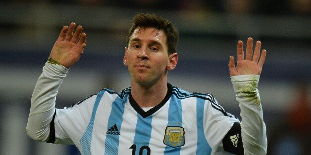 Lionel Messi of Argentina reacts during the International friendly football match Romania vs Argentina in Bucharest, Romania on March 5, 2014. AFP PHOTO / DANIEL MIHAILESCU (Photo credit should read DANIEL MIHAILESCU/AFP/Getty Images)
