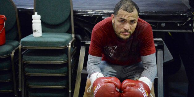 DENVER, CO - MAY 8: Mike Alvarado took a short break between rounds on the heavy bag Friday night, May 9, 2014. Alvarado is preparing for a May 17 match with Mexican boxing legend Juan Manuel Marquez in Los Angeles. (Photo by Karl Gehring/The Denver Post via Getty Images)