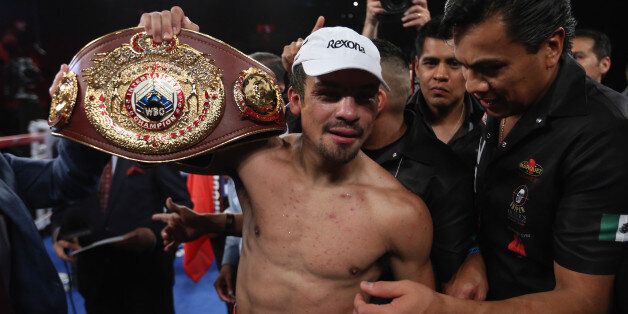 INGLEWOOD, CA - MAY 17: Juan Manuel Marquez celebrates his victory over Mike Alvarado at The Forum on May 17, 2014 in Inglewood, California. (Photo by Jeff Gross/Getty Images)