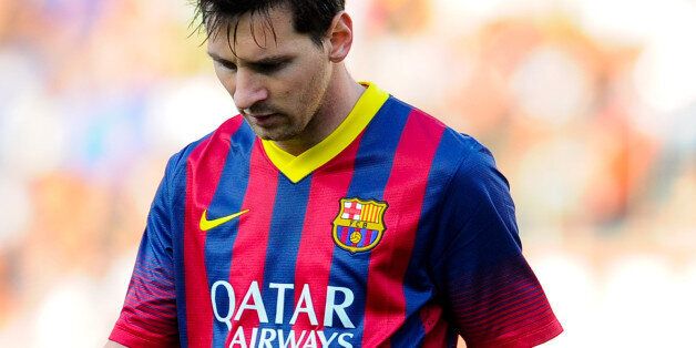 ELCHE, SPAIN - MAY 11: Lionel Messi of FC Barcelona looks down during the La Liga match between Elche FC and FC Barcelona at Estadio Manuel Martinez Valero on May 11, 2014 in Elche, Spain. (Photo by David Ramos/Getty Images)