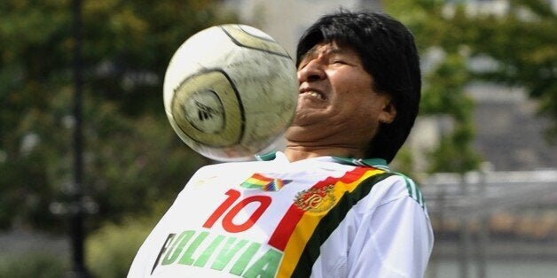 President of Bolivia Evo Morales and his team play a friendly soccer match with UN officials for 'Unite to End Violence Against Women' while the 67th session of the United Nations General Assembly continues, at Roosevelt Island Soccer Field in New York on September 26, 2012. AFP PHOTO/ TIMOTHY A. CLARY (Photo credit should read TIMOTHY A. CLARY/AFP/GettyImages)