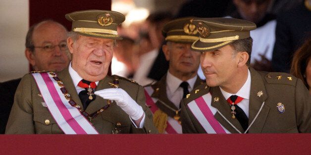 EL ESCORIAL, SPAIN - JUNE 03: King Juan Carlos of Spain and Prince Felipe of Spain attend the biannual meeting of San Hermenegildo Order on June 3, 2014 in El Escorial, Spain. (Photo by Europa Press/Europa Press via Getty Images)