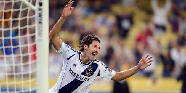 Omar Gonzalez of the LA Galaxy celebrates after scoring the opening goal of the match against Juventus during their International Champions Cup match at Dodger Stadium in Los Angeles on August 3, 2013. AFP PHOTO/Frederic J. BROWN (Photo credit should read FREDERIC J. BROWN/AFP/Getty Images)