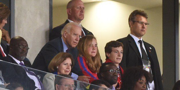 US Vice President Joe Biden (3L) attends a Group G football match between Ghana and US at the Dunas Arena in Natal during the 2014 FIFA World Cup on June 16, 2014. AFP PHOTO / EMMANUEL DUNAND (Photo credit should read EMMANUEL DUNAND/AFP/Getty Images)