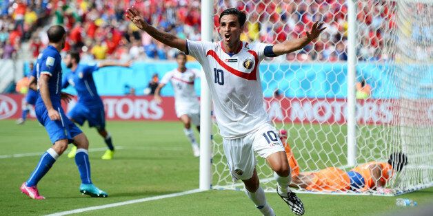 RECIFE, BRAZIL - JUNE 20: Bryan Ruiz of Costa Rica celebrates scoring his team's first goal during the 2014 FIFA World Cup Brazil Group D match between Italy and Costa Rica at Arena Pernambuco on June 20, 2014 in Recife, Brazil. (Photo by Jamie McDonald/Getty Images)