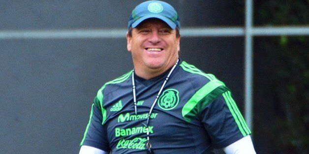 Mexico's coach Miguel Herrera takes part in a training session at the Rei Pele Training Center in Santos, Sao Paulo, on June 20, 2014 during the 2014 FIFA World Cup in Brazil. AFP PHOTO / Yuri CORTEZ (Photo credit should read YURI CORTEZ/AFP/Getty Images)