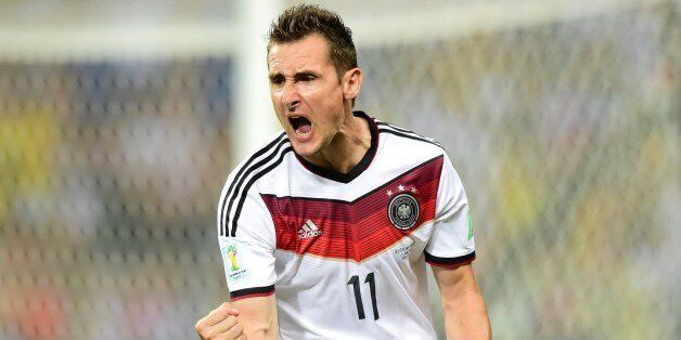 Germany's forward Miroslav Klose celebrates after scoring during a Group G football match between Germany and Ghana at the Castelao Stadium in Fortaleza during the 2014 FIFA World Cup on June 21, 2014. AFP PHOTO / JAVIER SORIANO (Photo credit should read JAVIER SORIANO/AFP/Getty Images)