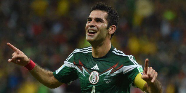 Mexico's defender Rafael Marquez celebrates after scoring the 0-1 during a Group A football match between Croatia and Mexico at the Pernambuco Arena in Recife during the 2014 FIFA World Cup on June 23, 2014. AFP PHOTO / YURI CORTEZ (Photo credit should read YURI CORTEZ/AFP/Getty Images)