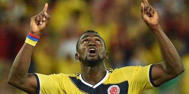 Colombia's forward Jackson Martinez celebrates after scoring his second goal during the Group C football match between Japan and Colombia at the Pantanal Arena in Cuiaba during the 2014 FIFA World Cup on June 24, 2014. AFP PHOTO / TOSHIFUMI KITAMURA (Photo credit should read TOSHIFUMI KITAMURA/AFP/Getty Images)