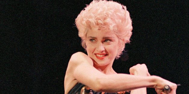 Pop star Madonna performs during a concert at the Seattle Kingdome, July 15, 1987 as part of her "Who's That Girl" world tour. (AP Photo)