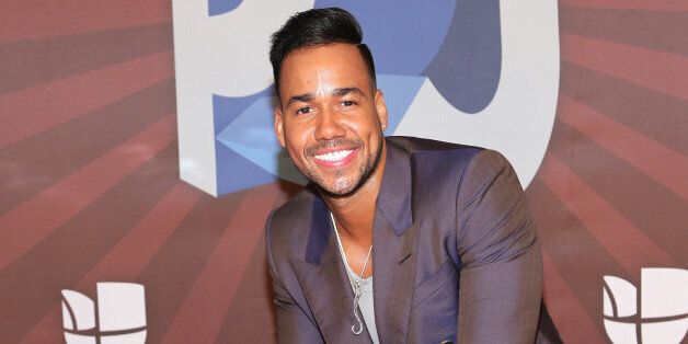 CORAL GABLES, FL - JULY 17: Romeo Santos poses in the press room during the Premios Juventud 2014 at The BankUnited Center on July 17, 2014 in Coral Gables, Florida. (Photo by Alexander Tamargo/Getty Images for Univision)