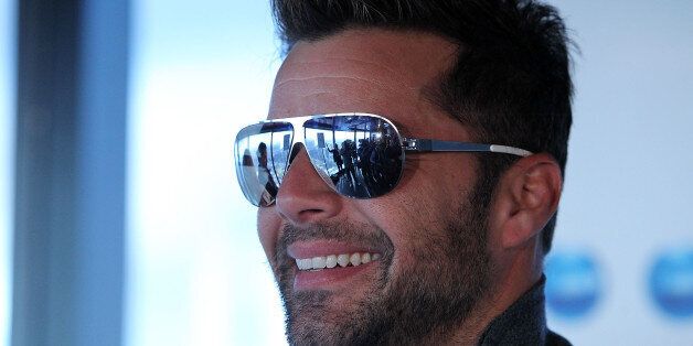 MELBOURNE, AUSTRALIA - JULY 16: Ricky Martin smiles at a Grand Finale event held at Eureka Tower on July 16, 2014 in Melbourne, Australia. (Photo by Graham Denholm/Getty Images)