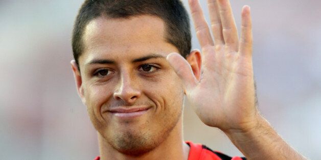 PASADENA, CA - JULY 23: Mexico star Javier 'Chicharito' Hernandez of Manchester United waves to fans as he trains before the game with the Los Angeles Galaxy at the Rose Bowl on July 23, 2014 in Pasadena, California. (Photo by Stephen Dunn/Getty Images)