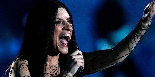 Italian singer Laura Pausini performs at the Vina del Mar International Song Festival in Vina del Mar, Chile, Monday, Feb. 24, 2014. Believed to be one of the largest musical events in Latin America, the annual weeklong festival was inaugurated in 1960. (AP Photo/Luis Hidalgo)