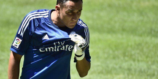 Costa Rica goalkeeper Keylor Navas poses during his official presentation at the Santiago Bernabeu stadium in Madrid on August 5, 2014. Navas, one of the stars of this year's World Cup, has completed his move to Real Madrid from Levante, and will be contracted to the club for the next six years who reportedly paid10 million-euro ($13.4m, Â£8m) for a release clause in Navas' contract. AFP PHOTO / GERARD JULIEN (Photo credit should read GERARD JULIEN/AFP/Getty Images)