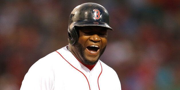 BOSTON, MA - JULY 9: David Ortiz #34 of the Boston Red Sox reacts after flying out in the fourth inning against the Chicago White Sox at Fenway Park on July 9, 2014 in Boston, Massachusetts. (Photo by Jim Rogash/Getty Images)