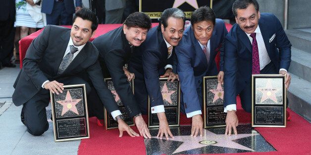 HOLLYWOOD, CA - AUGUST 21: Norteno group Los Tigres Del Norte is honored with a Star on the Hollywood Walk of Fame on August 21, 2014 in Hollywood, California. (Photo by David Livingston/Getty Images)