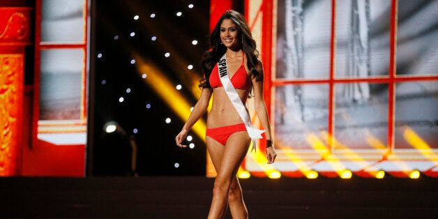 Miss Spain Patricia Yurena Rodriguez presents herself during the preliminary competition of the 2013 Miss Universe pageant in Moscow, Russia, on Tuesday, Nov. 5, 2013. Beauties will compete for the title of Miss Universe in Moscow on Nov. 9. (AP Photo/Pavel Golovkin)