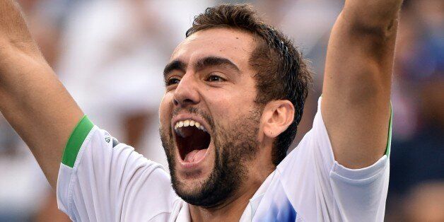 Marin Cilic of Croatia celebrates his win over Roger Federer of Switzerland during their 2014 US Open men's semifinal singles match at the USTA Billie Jean King National Tennis Center September 6, 2014 in New York. AFP PHOTO/Stan HONDA (Photo credit should read STAN HONDA/AFP/Getty Images)