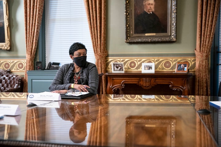 NEA President Becky Pringle, pictured at the White House in March, said unions should work with employers to implement vaccin