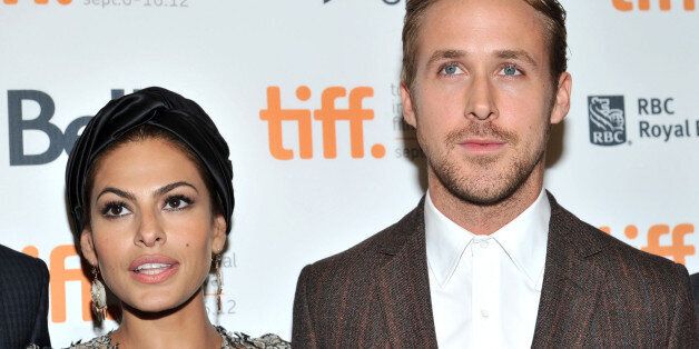 TORONTO, ON - SEPTEMBER 07: Actors (L-R) Eva Mendes and Ryan Gosling attend 'The Place Beyond The Pines' premiere during the 2012 Toronto International Film Festival at Princess of Wales Theatre on September 7, 2012 in Toronto, Canada. (Photo by Sonia Recchia/Getty Images)