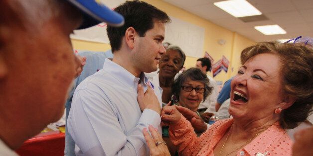 HIALEAH, FL - NOVEMBER 01: Republican Senate candidate Marco Rubio visits a campaign volunteer center on November 1, 2010 in Hialeah, Florida. Rubio is the front runner as campaigning comes to an end in the Florida Senate race against his opponentï¿½s independent candidate Charlie Crist and Democratic candidate Rep. Kendrick Meek (D-FL). (Photo by Joe Raedle/Getty Images)