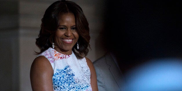 WASHINGTON, DC - JUNE 18: Michelle Obama speaks during a special naturalization ceremony at The National Archives on June 18, 2014 in Washington, DC. (Photo by Leigh Vogel/WireImage)