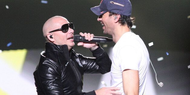NEW YORK, NY - SEPTEMBER 25: Enrique Iglesias and Pitbull perform at Madison Square Garden on September 25, 2014 in New York City. (Photo by Laura Cavanaugh/Getty Images)