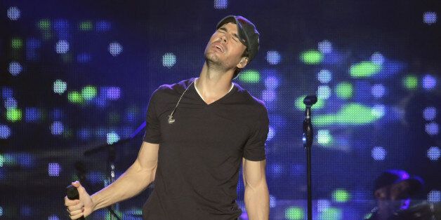 ATLANTIC CITY, NJ - SEPTEMBER 26: Enrique Iglesias performs at Atlantic City Boardwalk Hall on September 26, 2014 in Atlantic City, New Jersey. (Photo by Donald Kravitz/Getty Images)