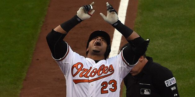 BALTIMORE, MD - OCTOBER 02: Nelson Cruz #23 of the Baltimore Orioles celebrates after hitting a two run home run to right center field against Max Scherzer #37 of the Detroit Tigers in the first inning during Game One of the American League Division Series at Oriole Park at Camden Yards on October 2, 2014 in Baltimore, Maryland. (Photo by Patrick Smith/Getty Images)