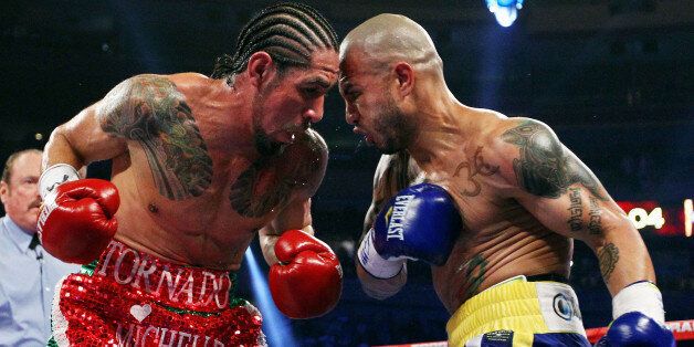 NEW YORK, NY - DECEMBER 03: Miguel Cotto (R) of Puerto Rico and Antonio Margarito of Mexico exchange blows during the WBA World Junior Middleweight Title fight at Madison Square Garden on December 3, 2011 in New York City. (Photo by Al Bello/Getty Images)