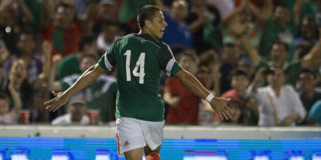 TUXTLA GUTIERREZ, MEXICO - OCTOBER 09: Javier Hernandez of Mexico celebrates after scoring during a friendly match between Mexico and Honduras at Victor Manuel Reyna Stadium on October 09, 2014 in Tuxtla Gutierrez, Mexico. (Photo by Miguel Tovar/LatinContent/Getty Images)