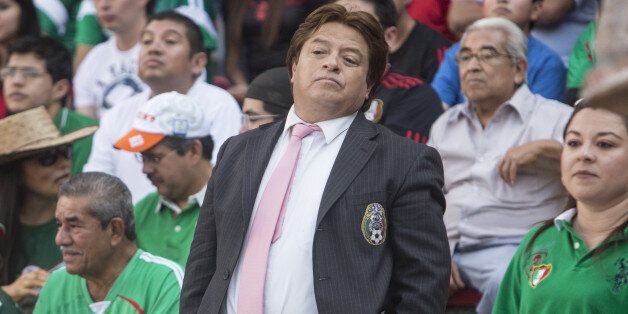 QUERETARO, MEXICO - OCTOBER 12: A fan of Mexico wearing as Miguel Herrera coach of Mexico watch the game during a friendly match between Mexico and Panama at Corregidora Stadium on October 12, 2014 in Queretaro, Mexico. (Photo by Miguel Tovar/LatinContent/Getty Images)