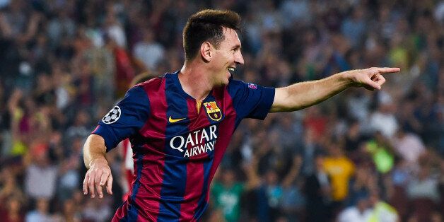 BARCELONA, SPAIN - OCTOBER 21: Lionel Messi of FC Barcelona celebrates after scoring his team's second goal during a UEFA Champions League Group F match between FC Barcelona and AFC Ajax at the Camp Nou Stadium on October 21, 2014 in Barcelona, Spain. (Photo by David Ramos/Getty Images)