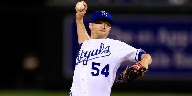 KANSAS CITY, MO - OCTOBER 21: Jason Frasor #54 of the Kansas City Royals pitches in the ninth inning against the San Francisco Giants during Game One of the 2014 World Series at Kauffman Stadium on October 21, 2014 in Kansas City, Missouri. (Photo by Jamie Squire/Getty Images)
