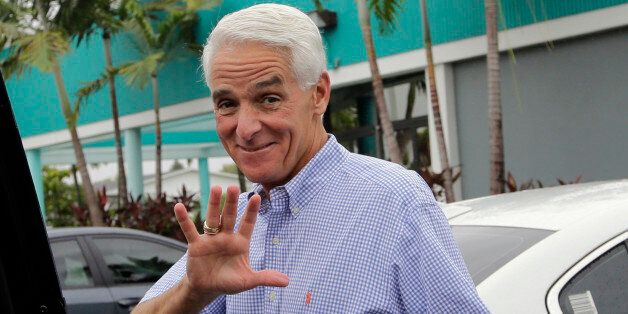 Florida Democratic gubernatorial candidate Charlie Crist waves after addressing senior citizens while campaigning at Century Village, Thursday, Oct. 23, 2014, in Deerfield Beach, Fla. Crist is running against Republican Gov. Rick Scott in the Nov. 4 election. (AP Photo/Lynne Sladky)