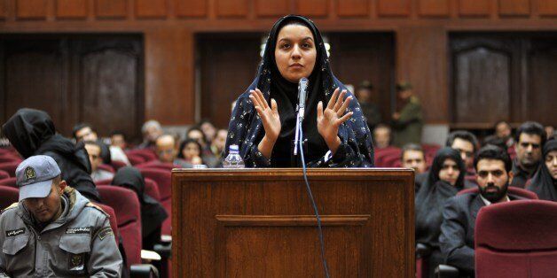 A picture taken on December 15, 2008 at a court in Tehran shows Iranian Reyhaneh Jabbari speaking to defend herself during the first hearing of her trial for the murder of a former intelligence official. Jabbari who is awaiting an impending death sentence for slaying of former intelligence official Morteza Abdolali Sarbandi, could be forgiven if 'she tells the truth', the victim's son said on April 19, 2014 as a UN human rights monitor claims the crime was done in self-defence against a potential rapist. AFP PHOTO/GOLARA SAJADIAN (Photo credit should read GOLARA SAJADIAN/AFP/Getty Images)