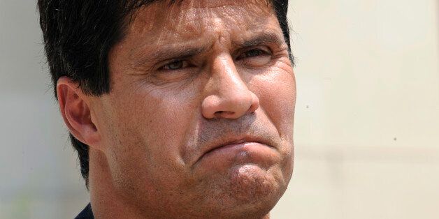 Jose Canseco talks with reporters after appearing in federal court in Washington, Thursday, June 3, 2010. (AP Photo/Susan Walsh)