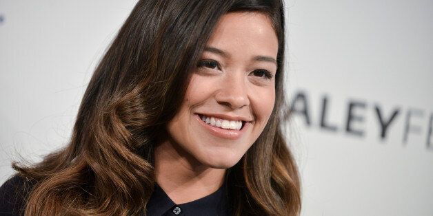 FILE - In this Sept. 6, 2014 file photo, actress Gina Rodriguez arrives at the 2014 PALEYFEST Fall TV Previews - The CW in Beverly Hills, Calif. Rodriguez portrays Jane in The CW series, "Jane The Virgin," premiering Monday, Oct. 13, 2014. (Photo by Richard Shotwell/Invision/AP)