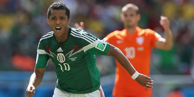 FORTALEZA, BRAZIL - JUNE 29: Giovani dos Santos of Mexico celebrates scoring during the Round of 16 match of the 2014 World Cup between Netherlands and Mexico at the Estadio Castelao on June 29, 2014 in Fortaleza, Brazil. (Photo by Ian MacNicol/Getty Images)