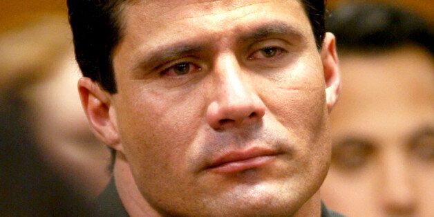 FILE - In this Feb. 18, 2003 file photo, former baseball star Jose Canseco appears at a court hearing in Miami. Police in Las Vegas on have cleared the former baseball slugger on Friday June 7, 2013, after an investigation of a woman's rape claim. (AP Photo/Al Diaz, Pool, File)