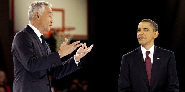 US President Barack Obama (R) participates in a town hall hosted by Univision at Bell Multicultural High School in Washington, DC, March 28, 2011 with Univision co-Anchor Jorge Ramos (L). AFP PHOTO/Jim WATSON (Photo credit should read JIM WATSON/AFP/Getty Images)