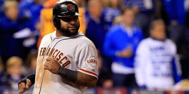 KANSAS CITY, MO - OCTOBER 29: Pablo Sandoval #48 of the San Francisco Giants reacts after scoring in the fourth inning against the Kansas City Royals during Game Seven of the 2014 World Series at Kauffman Stadium on October 29, 2014 in Kansas City, Missouri. (Photo by Jamie Squire/Getty Images)