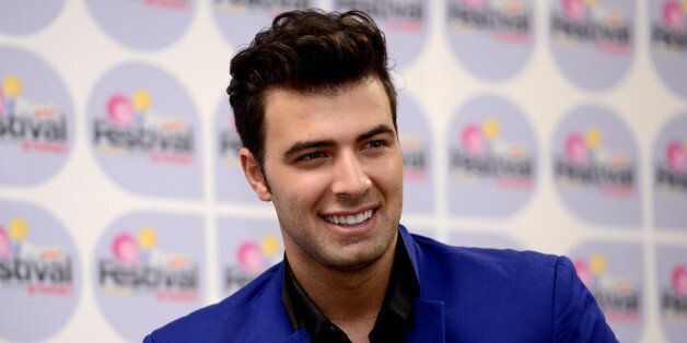 Singer Jencarlos Canela backstage at Festival People en Espanol 2013, on Saturday, August 31, 2013 at Alamodome in San Antonio, Texas. (Photo by Darren Abate/Invision for People Espanol/AP Images)