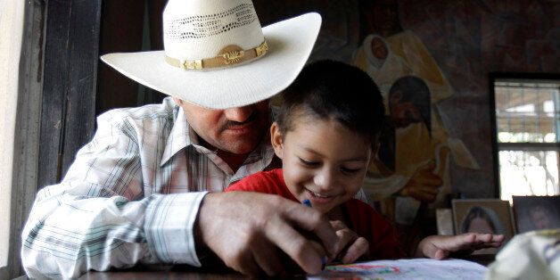 Miguel, 3, plays with his father, Miguel, an illegal immigrant, Friday, Aug. 27, 2010, in San Juan, Texas. Miguel and his wife, who remain in the U.S. as illegal immigrants, have two children born in the U.S. (AP Photo/Eric Gay)