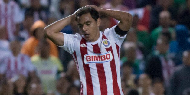 TUXTLA GUTIERREZ, MEXICO - JANUARY 10: Omar Bravo of Guadalajara reacts during the match between Chiapas and Guadalajara Bancomer League Clausura 2015 tournament, held at the Victor Manuel Reyna stadium on January 10, 2014 in Tuxtla Gutierrez, Chiapas, Mexico. (Photo by Luis Licona/Straffon Images/LatinContent/Getty Images)
