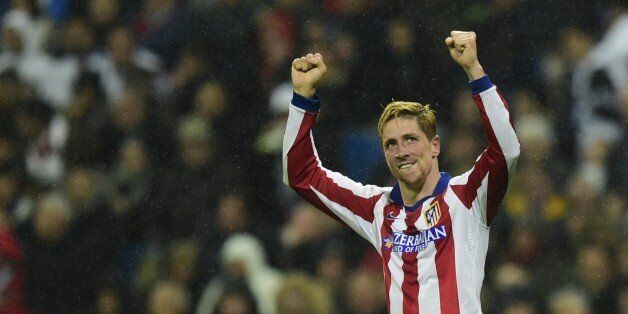 Atletico Madrid's forward Fernando Torres celebrates after scoring his second goal during the Spanish Copa del Rey (King's Cup) round of 16 second leg football match Real Madrid CF vs Club Atletico de Madrid at the Santiago Bernabeu stadium in Madrid on January 15, 2015. AFP PHOTO/ JAVIER SORIANO (Photo credit should read JAVIER SORIANO/AFP/Getty Images)