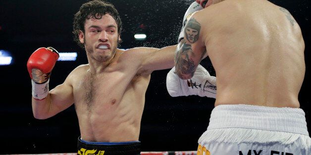 Julio Cesar Chavez Jr., left, and Bryan Vera, right, during a 12-round super middleweight bout, Saturday, March 1, 2014, in San Antonio. Chavez won by decision. (AP Photo/Eric Gay)