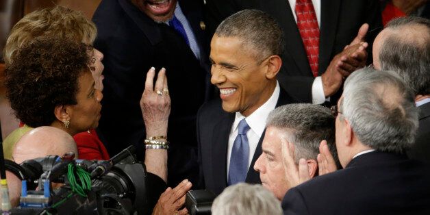 President Barack Obama is greeted on Capitol Hill in Washington, Tuesday, Jan. 20, 2015, before his State of the Union address before a joint session of Congress. (AP Photo/Pablo Martinez Monsivais)